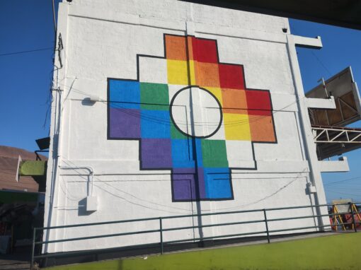 Pintura mural Cruz Chakana Terminal Agropecuario Iquique 2026